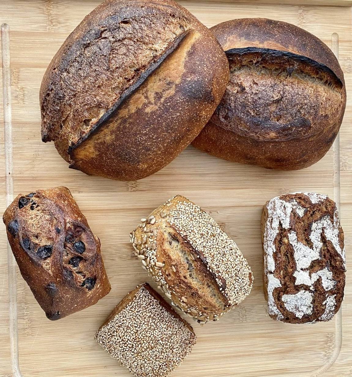 An assortment of naturally leavened loaves