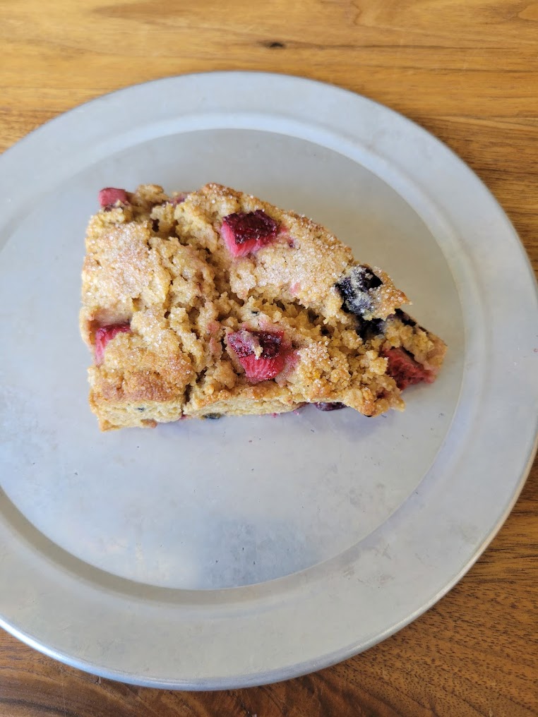 A slice of berry crumble cake